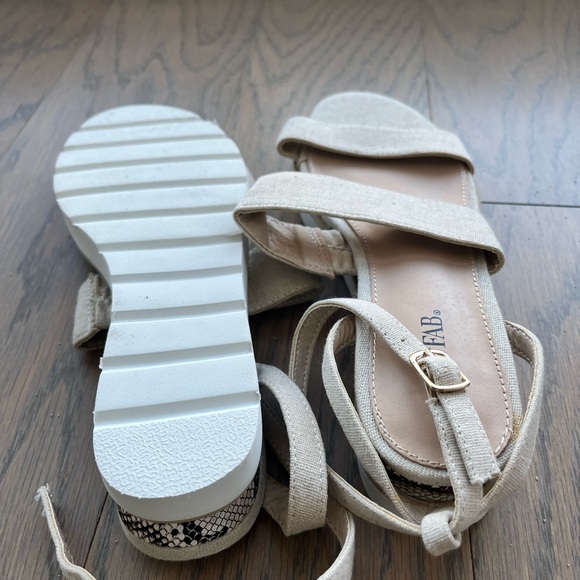 Beige strappy sandals with a slight lift. Beautiful faux snakeskin accents! - Picture 2 of 3